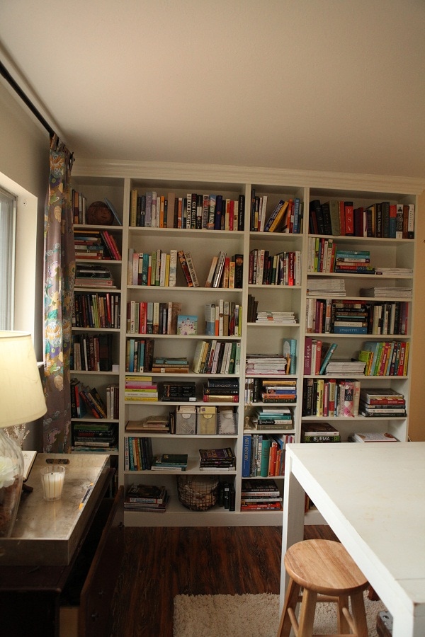 A library wall in a craft room.