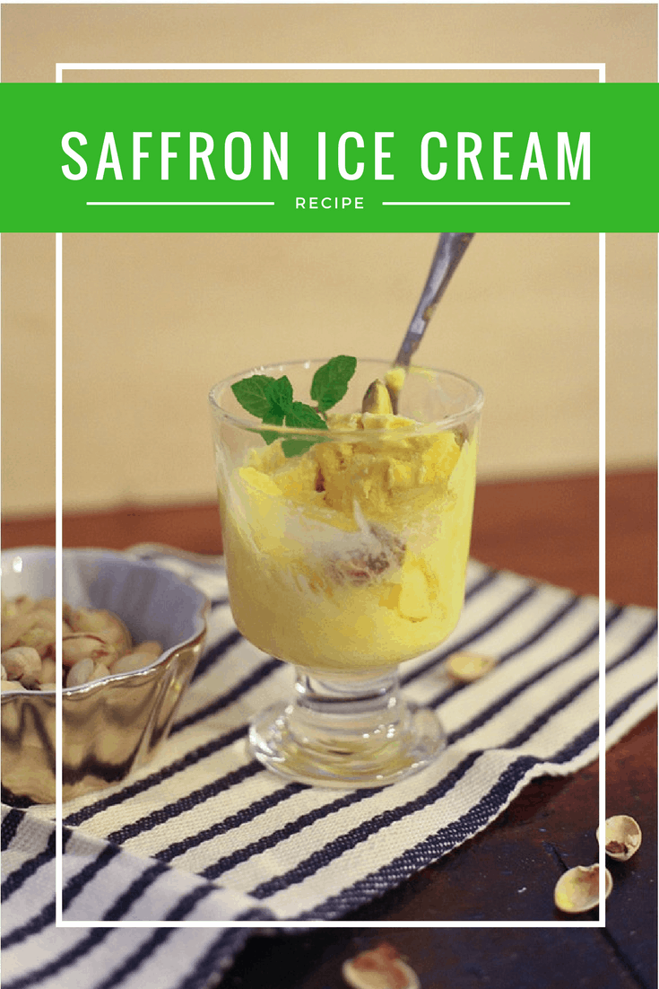 Saffron ice cream with pistachios in a bowl and mint leaves on top