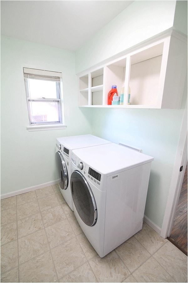 A bare clean laundry room in a house that is staged to sell