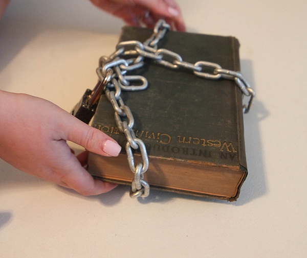 A book with a chain wrapped around it 