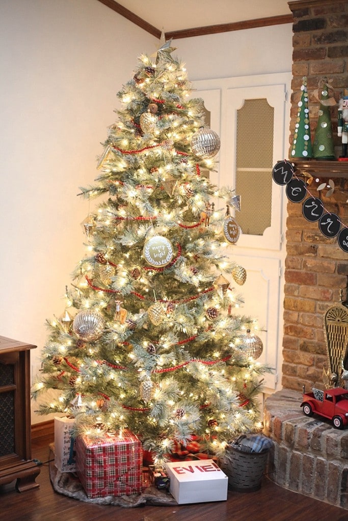 Rustic Christmas tree covered in rustic Christmas decorations