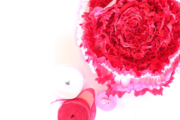 What a cool way to use crepe paper to decorate for Valentine's Day! Totally doing this, they are like $1 each! Love!