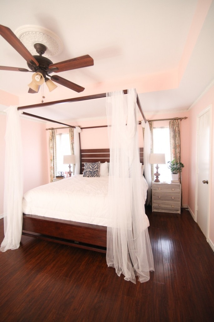 pink bedroom with canopy bed 