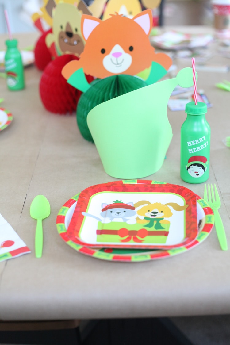 I LOVE the idea of a kids Christmas table! This decor is so cute and the entire thing cost less than $100. I really want to do a Christmas table for kids this year! 