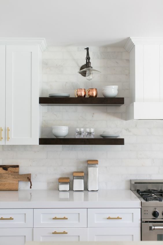 The white kitchen is my favorite! White cabinets and white counters are just so pretty and clean.