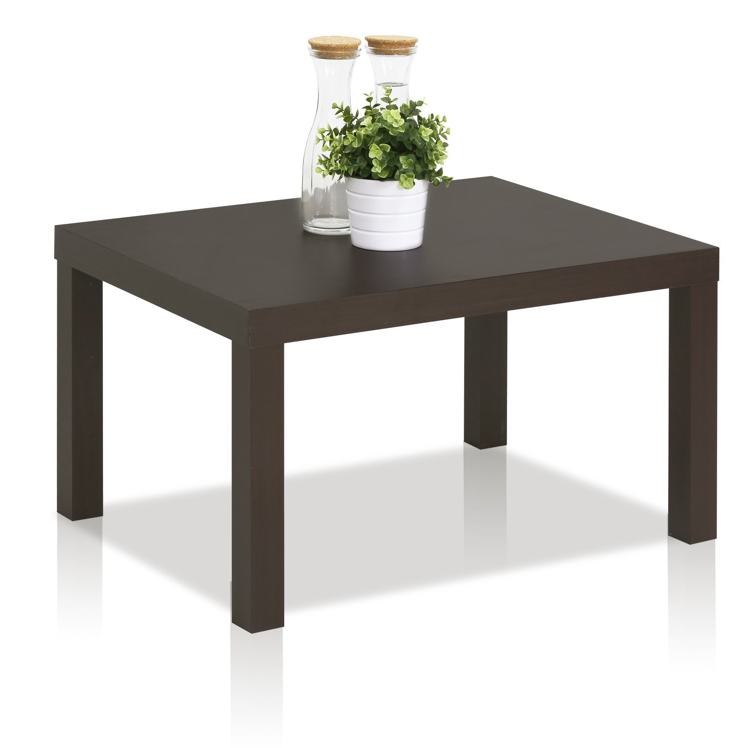 A simple and small rectangular wood coffee table. 