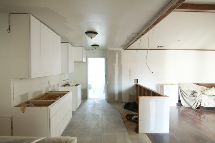 Love this kitchen remodeling post! They opened the galley kitchen - looks so beautiful! 