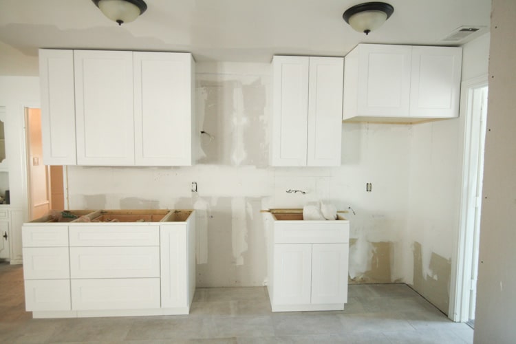 Love this kitchen remodeling post! They opened the galley kitchen - looks so beautiful! 
