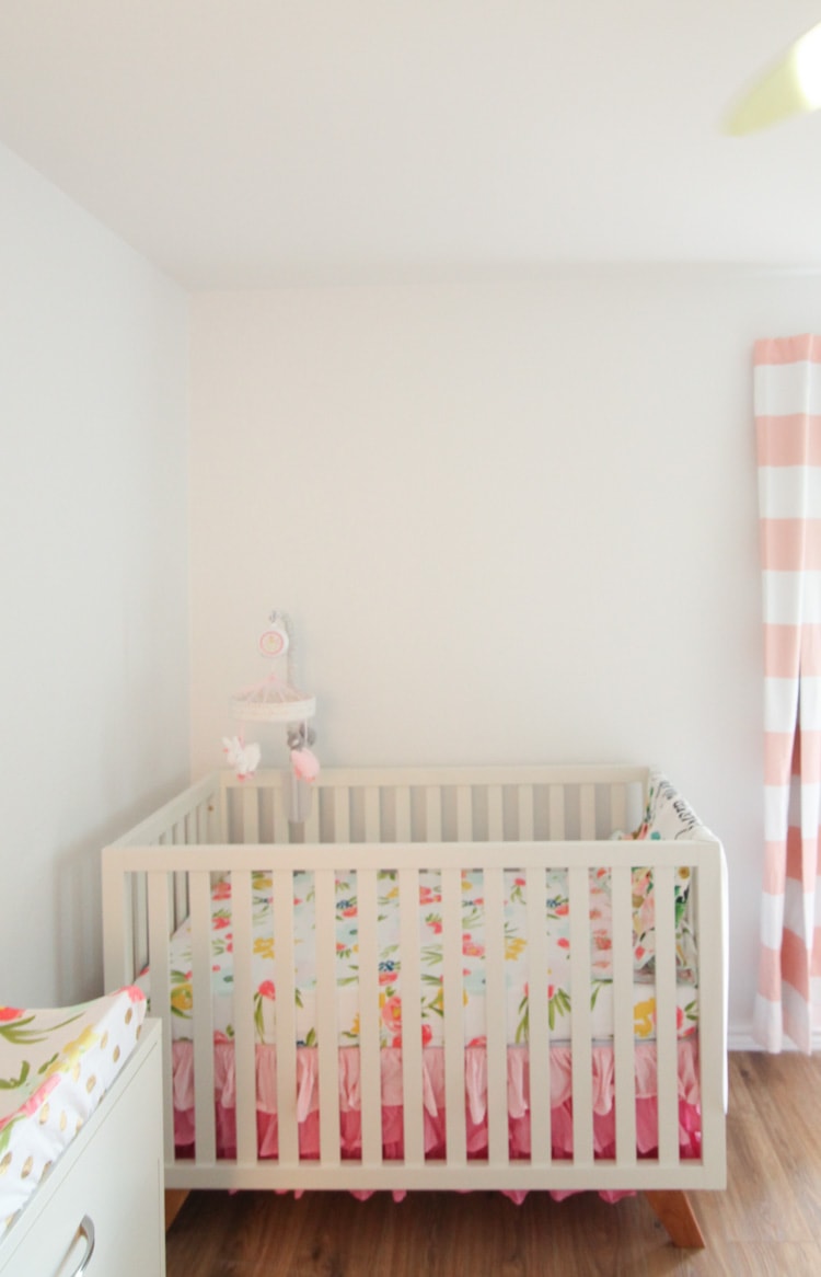 This framed wallpaper in the nursery is so cute! Such a smart idea for what to do with leftover wallpaper—love this framed wallpaper diy and the print on these panels! 