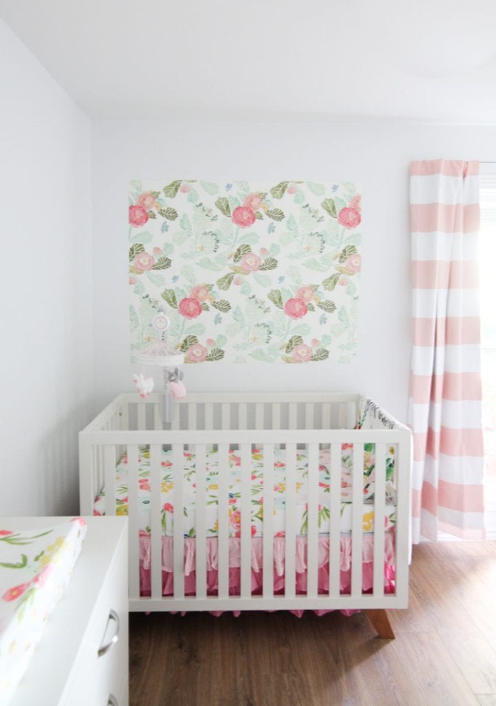 This framed wallpaper in the nursery is so cute! Such a smart idea for what to do with leftover wallpaper—love this framed wallpaper diy and the print on these panels!