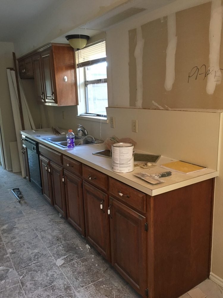 I have a small galley kitchen and have been looking for small kitchen layout on a budget ideas and tips. This Galley kitchen remodel is budget friendly and looks pretty easy!