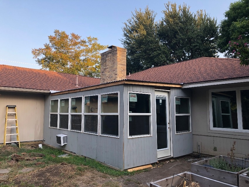 DIY Sunroom with view of window treatmeants from outside