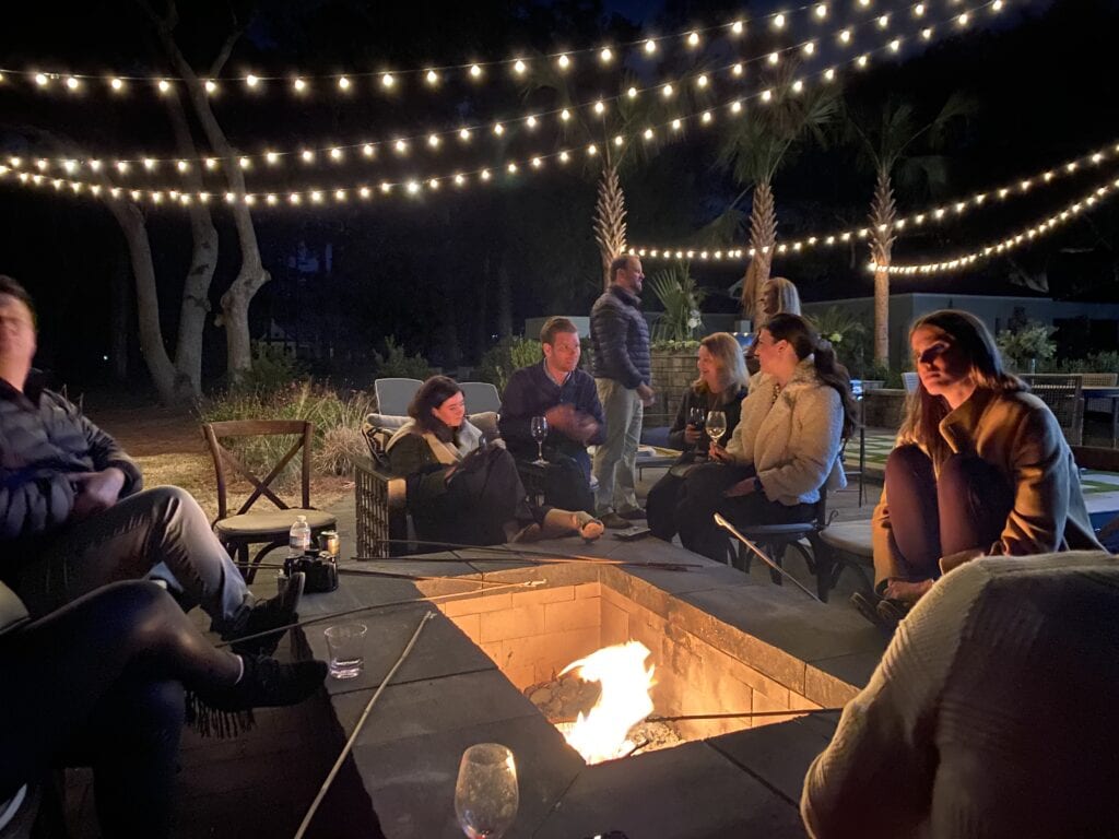 People around a firepit outside