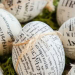 book page decorated easter eggs with twine tied around