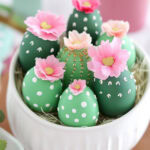 easter eggs painted to look like little cactus