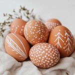 decorated natural eggs on a piece of cloth