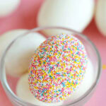 an egg coated in non-pareils sprinkles