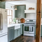 green and white cozy kitchen with white appliances