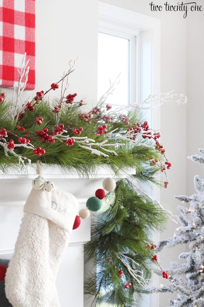 incorporating berries into holiday mantel decor