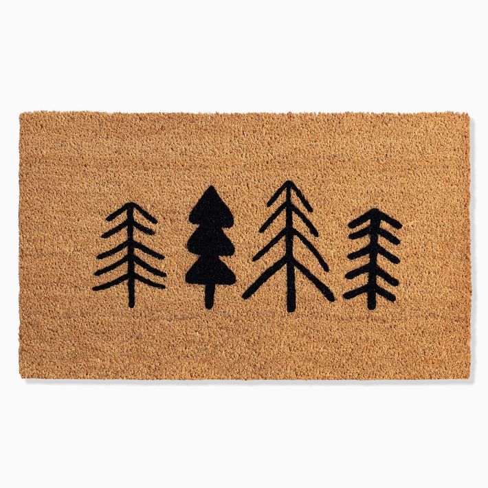 minimalist style coir rug with black trees