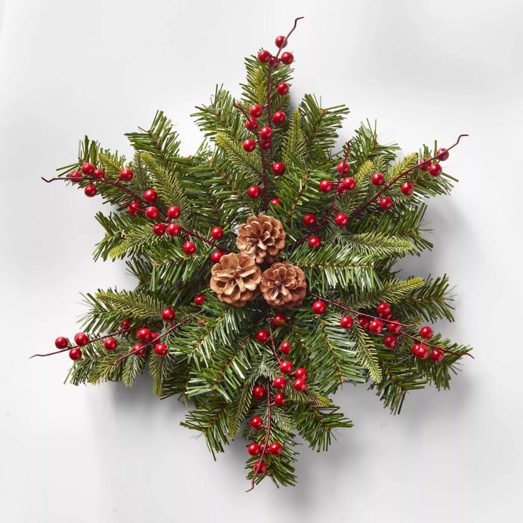 a green wreath shaped like a snowflake for indoor Christmas decor