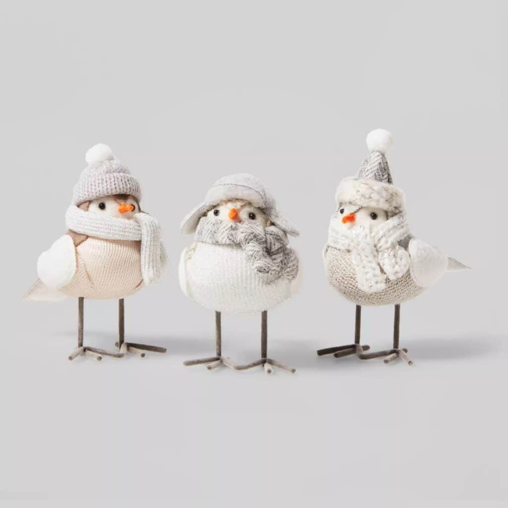 three knit bird figurines with scarves and hats for indoor holiday decor