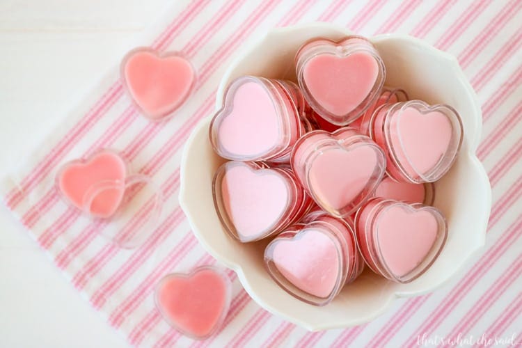 lip gloss in heart-shaped containers make great Galentine's Day gifts