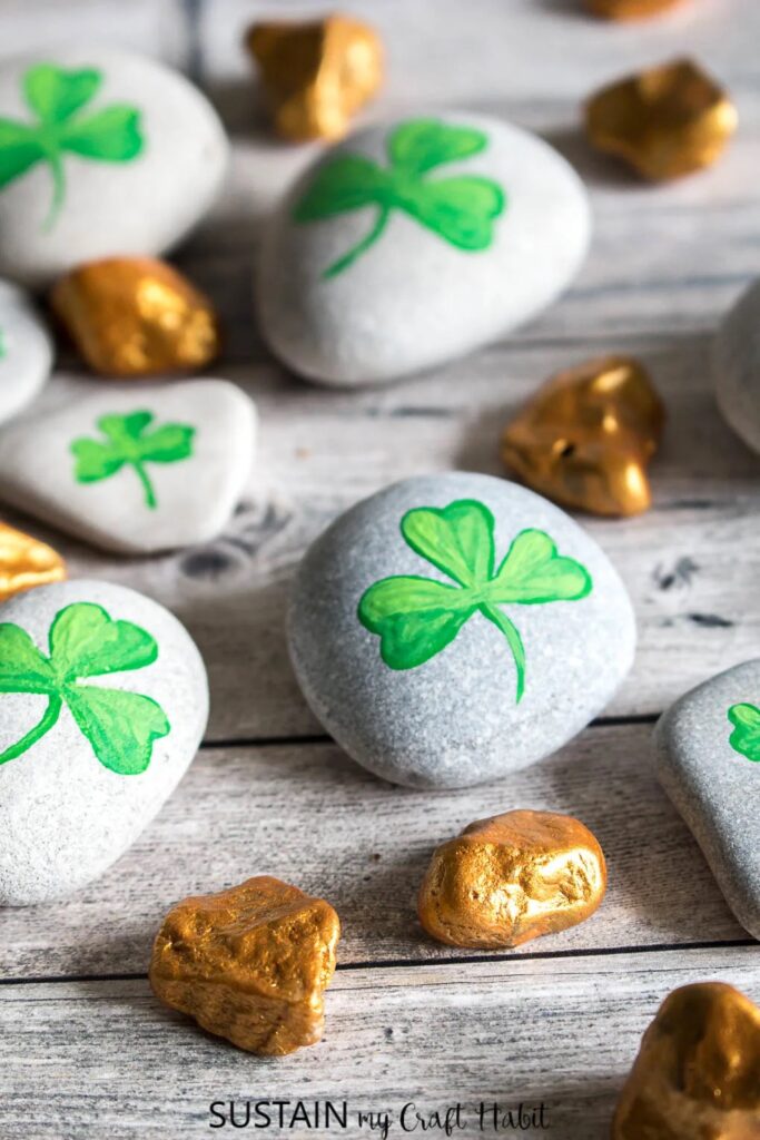 gold-painted rocks and rocks with painted shamrocks