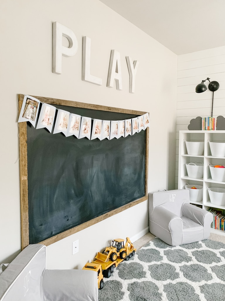 large diy chalkboard in a play space