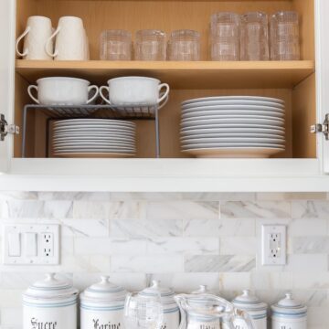 streamlined white dishes for how to organize kitchen cabinets