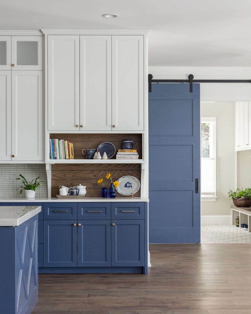 tall modern navy and white kitchen cabinets