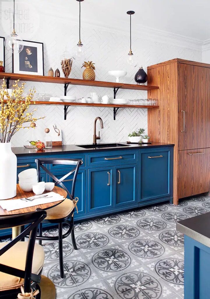 mcm two-tone blue kitchen cabinets and white backsplash