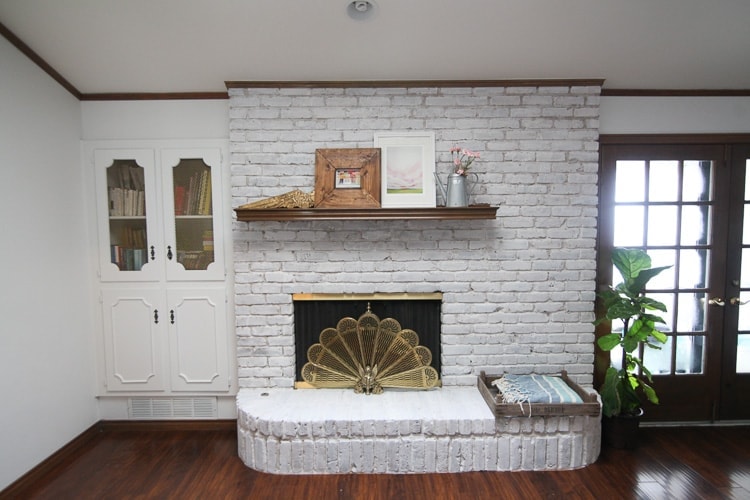 Fireplace painted white.
