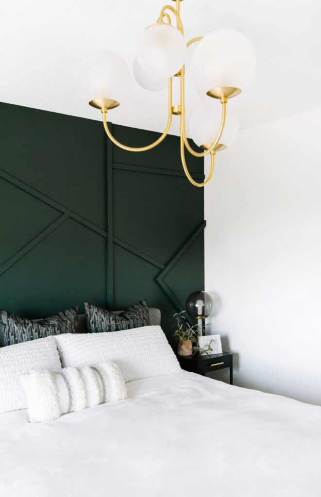 geometric moulding design on master bedroom wall