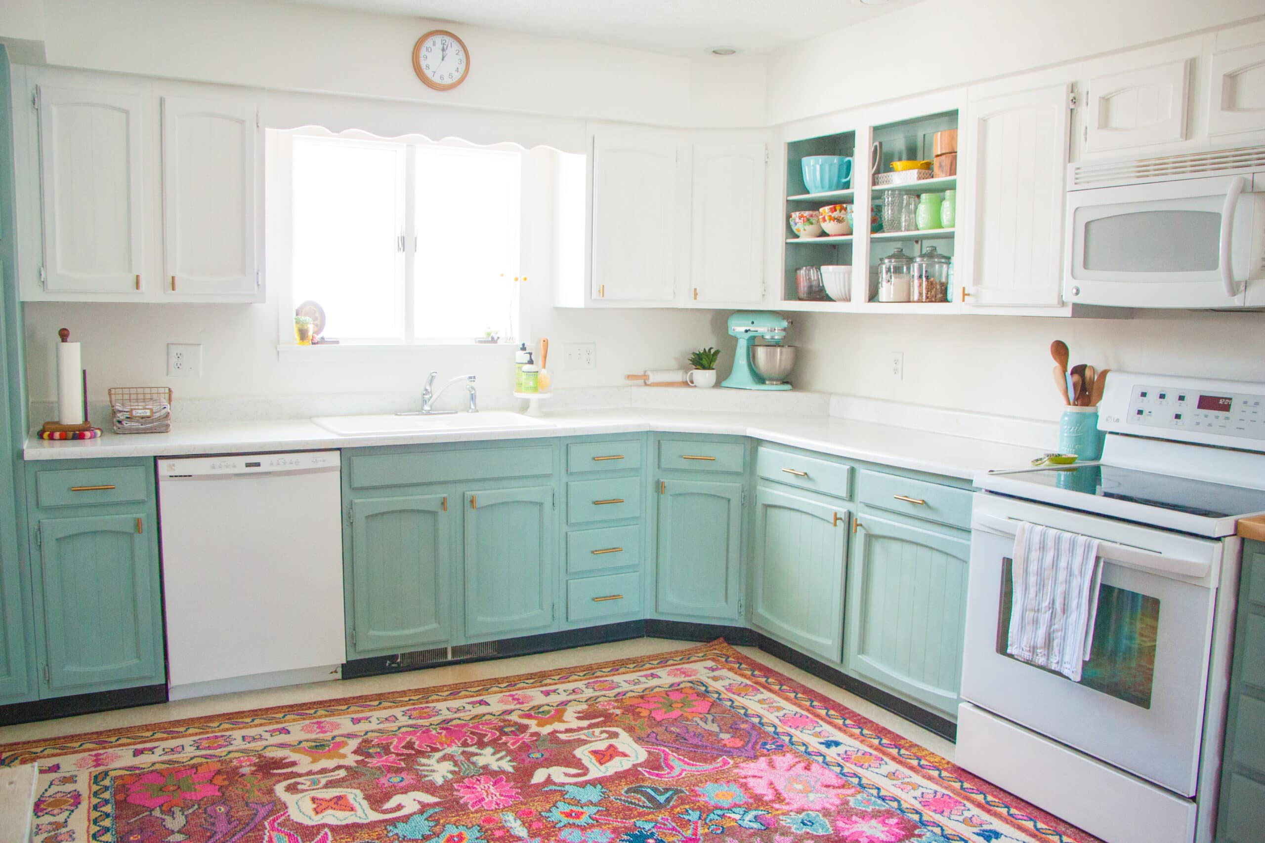 From white laminate kitchen to a green and white two-toned kitchen -  Cuckoo4Design