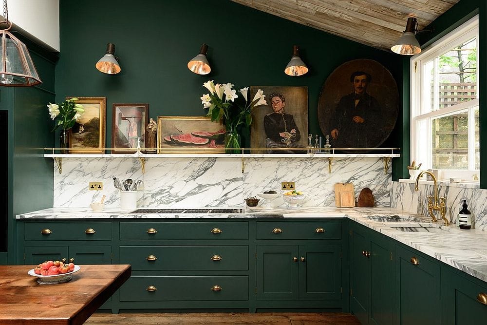 green accent wall in kitchen against green cabinetry