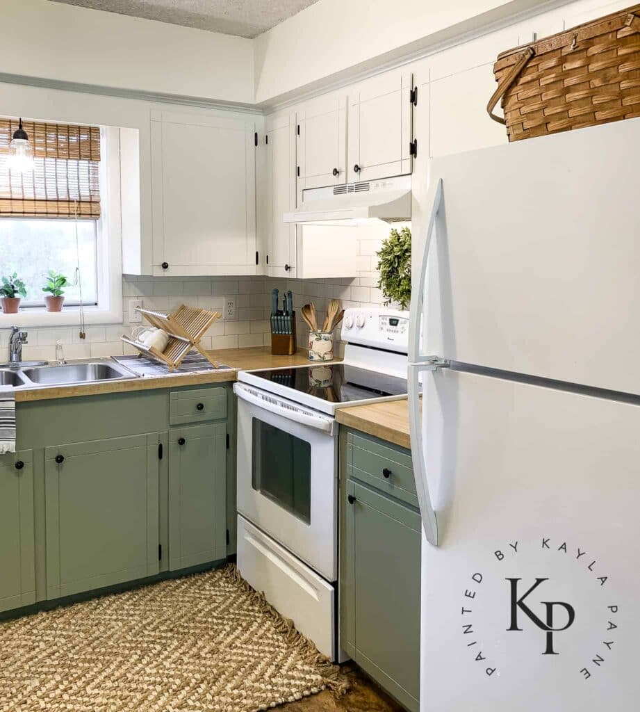 small white and green kitchen space