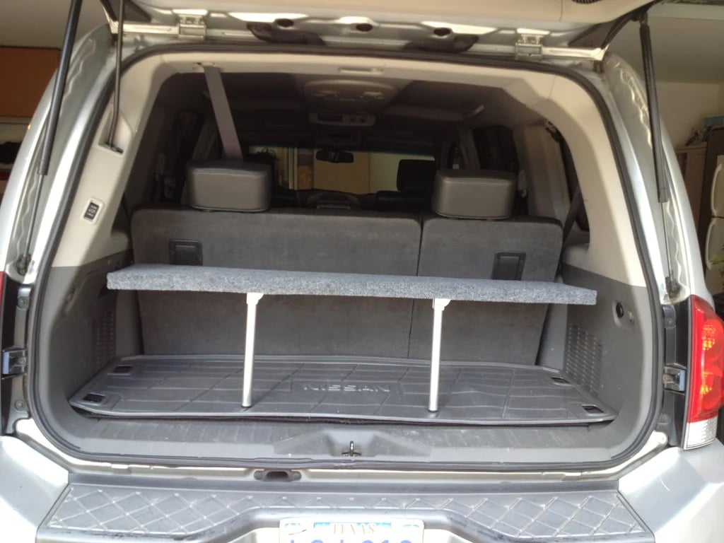 trunk riser shelf for storage