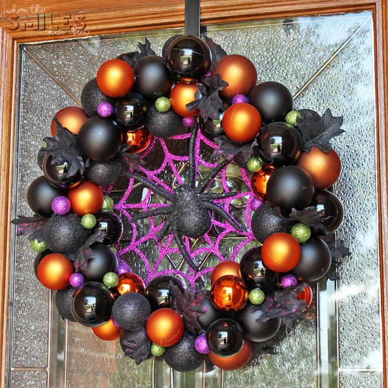 Black, orange and purple Halloween wreath ideas with ball ornaments. 