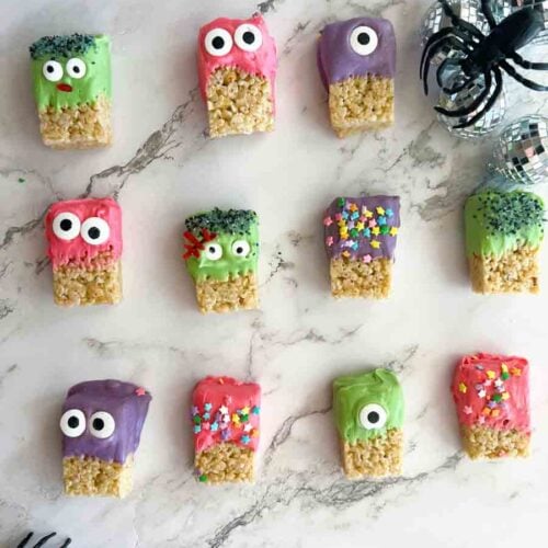 Rice Krispie treats dipped in icing and decorated to look like little monsters.