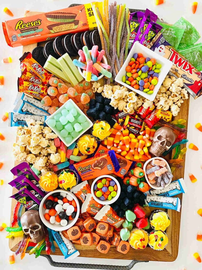 kid candy filling a Trick or Treat Charcuterie board