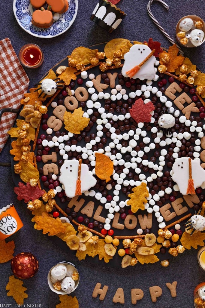 M&M's forming a spiderweb on a dessert tray