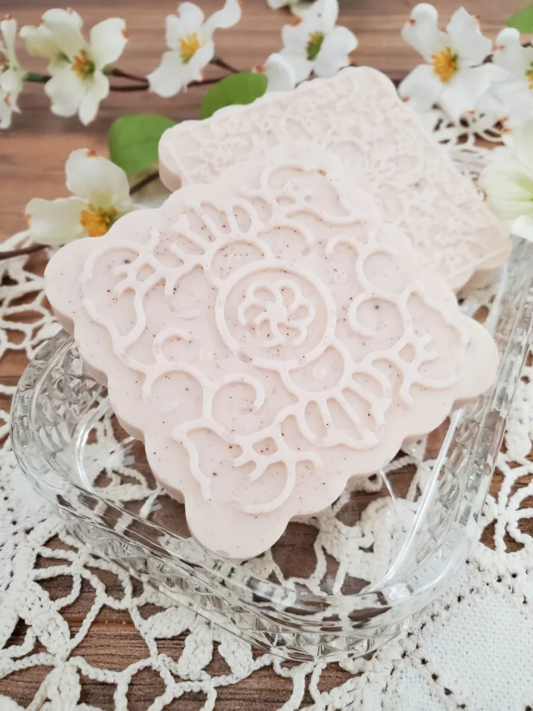 intricate homemade soap bars on a doily