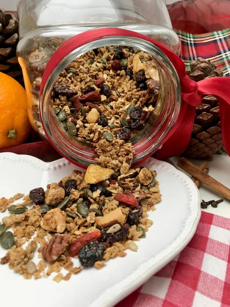Christmas granola spilling out onto a platter