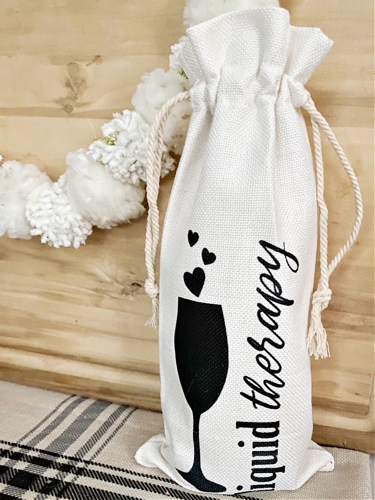 custom wine bag that says "liquid therapy" 