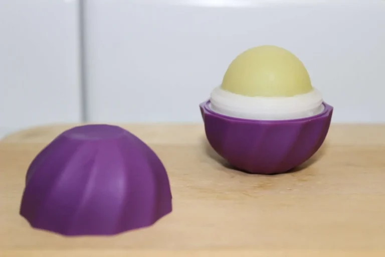 DIY vanilla lip balm in a purple EOS balm style container