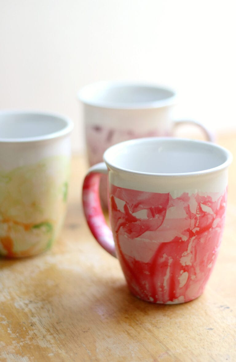 three nail polish marbled mugs