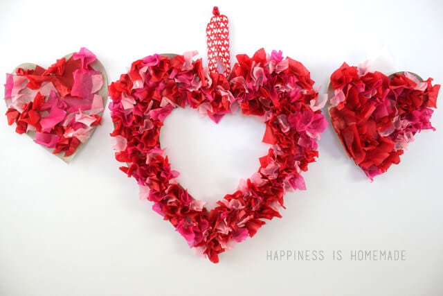 red heart wreath made with little bunches of tissue paper