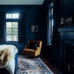 blue leaning black bedroom