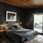wood ceilings and a brick wall for a beautiful, casual black bedroom